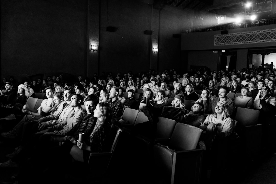 Photo by Daniel Guerra a black and white photo of a crowd of people